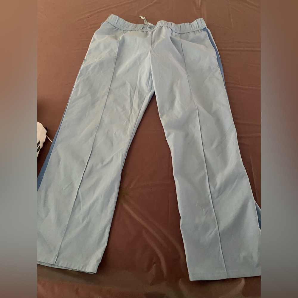 Express Track pants with side stripe. Light blue with darker blue stripe. S.